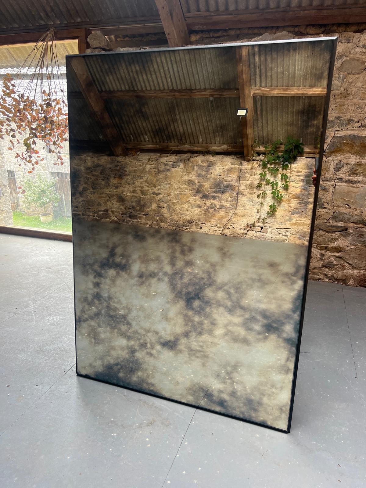 Clouded borderless antiqued mirror - 91 x 127cm