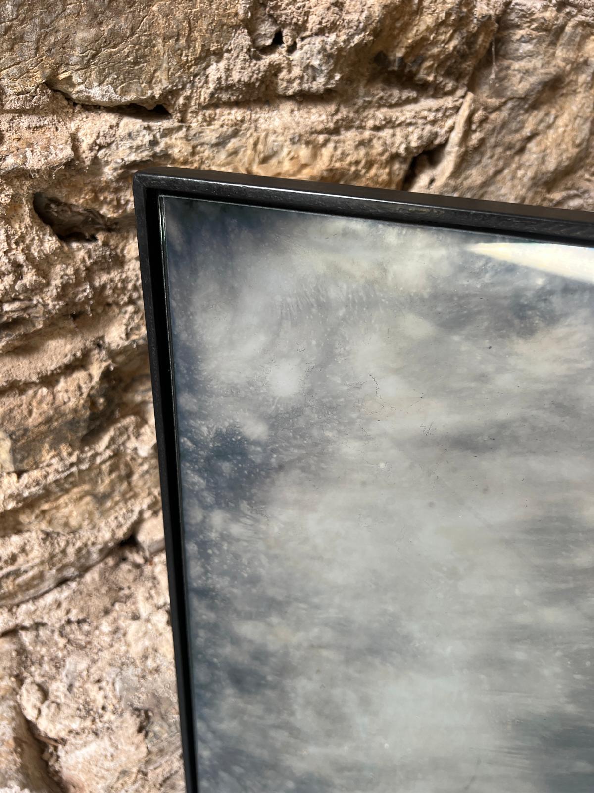 Clouded framed, panelled antiqued mirror - 900 x 600mm