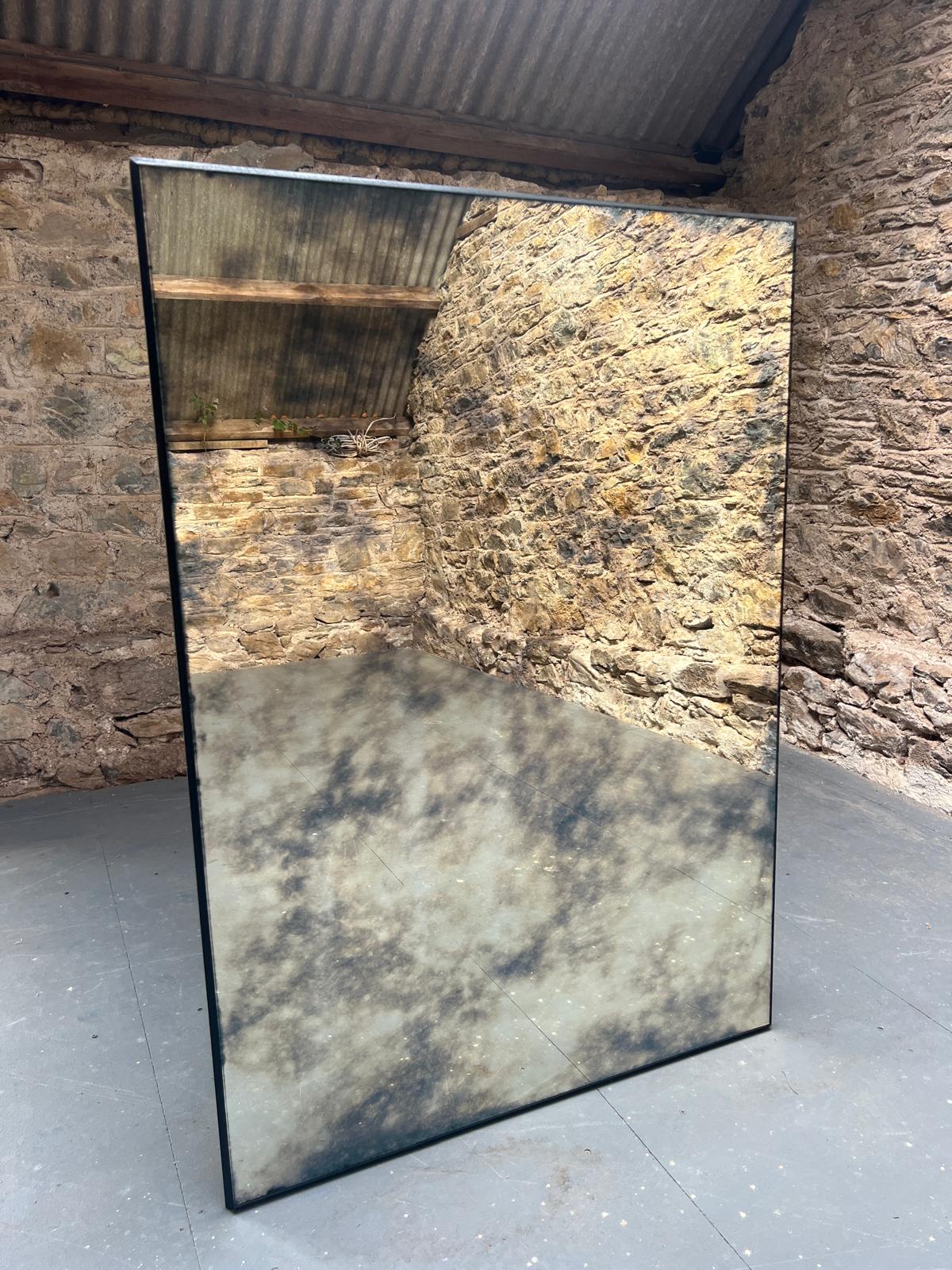 Clouded borderless antiqued mirror - 91 x 127cm