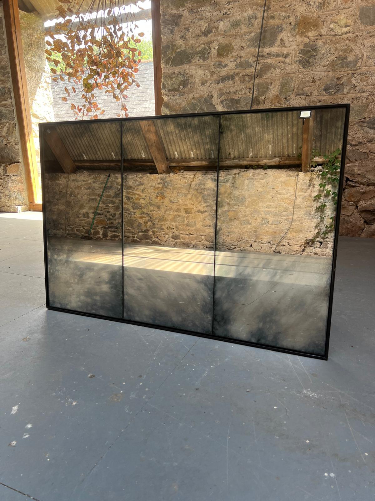 Clouded framed, panelled antiqued mirror - 900 x 600mm